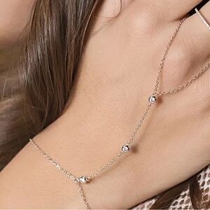 Silvery-plated rhinestone mitten bracelet